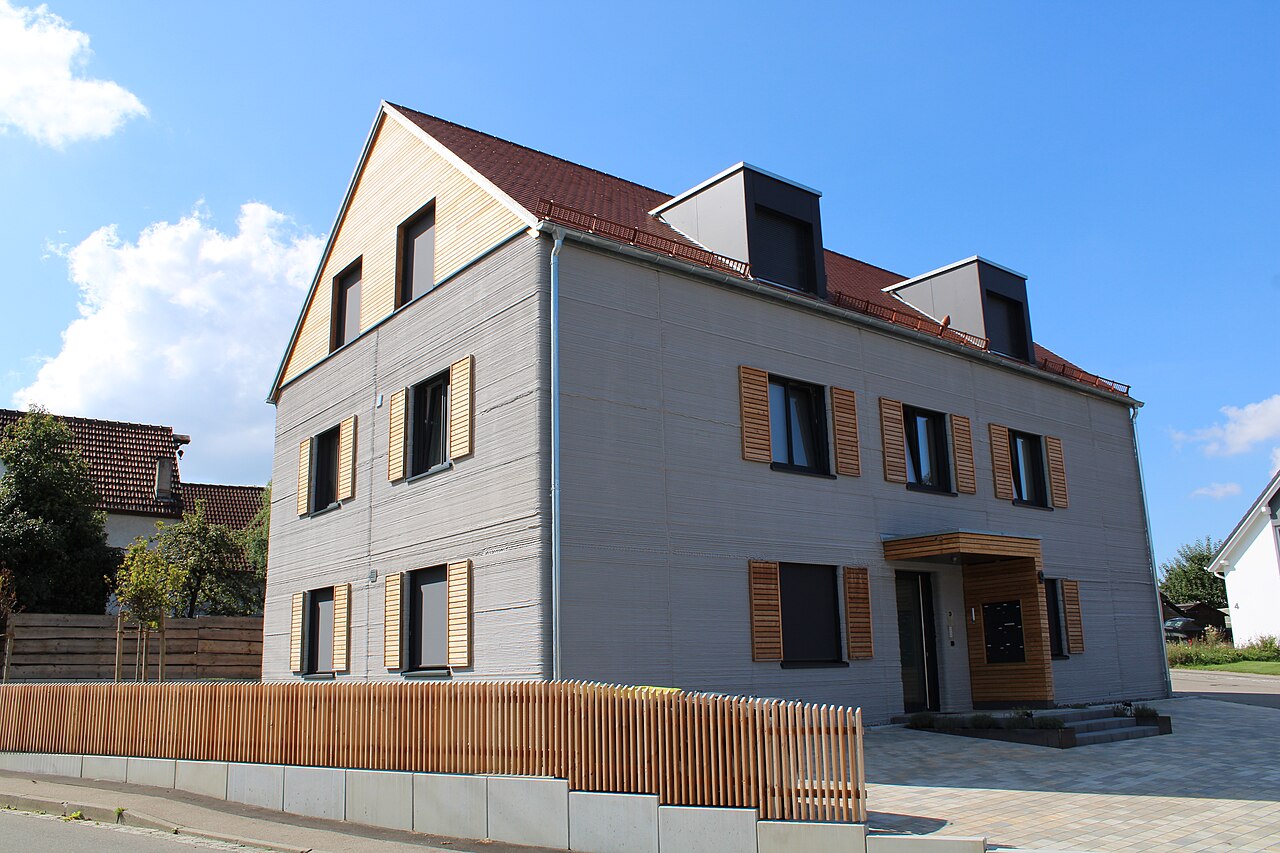 Edificio residencial de Wallenhausen con muros realizados mediante impresión 3D y cubierta convencional